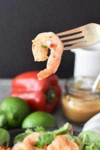 close up of a piece of shrimp from the thai shrimp salad