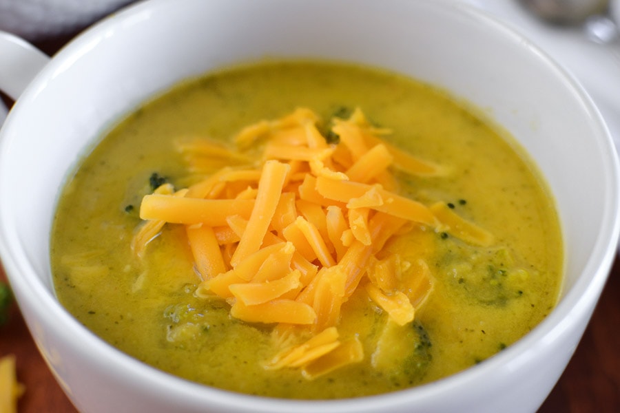 This 21 Day Fix broccoli cheese soup {Instant Pot | Stovetop} is made without any milk or cream and is still creamy, velvety, and deliciously healthy comfort in a bowl. Quick, easy, gluten free and kid-friendly! #instantpot #21dayfix #quick #easy #dinner #lunch