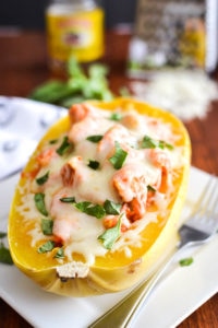 Cheesy Spaghetti Squash Boats with Chicken and Roasted Red Pepper Cream Sauce
