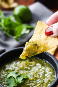 Easy, 21 Day Fix approved homemade roasted salsa verde. Perfect with chips, on tacos or in a 7-layer dip!