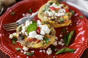 These 21 Day Fix Mediterranean Egg Cups with Goat Cheese and Basil are a a healthy and flavorful make-ahead breakfast! Perfect for meal-prepping!