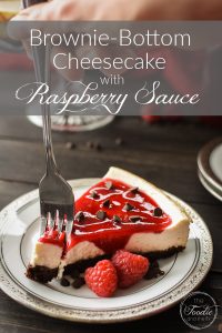 Brownie-bottom cheesecake with raspberry sauce graphic
