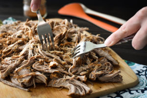 This Slow-Cooker 21 Day Fix Southwestern Pulled Pork Tenderloin makes a delicious, healthy base for tacos, BBQ sandwiches, soups and so much more! Make it on Sunday and use throughout the week for quick, easy dinners!