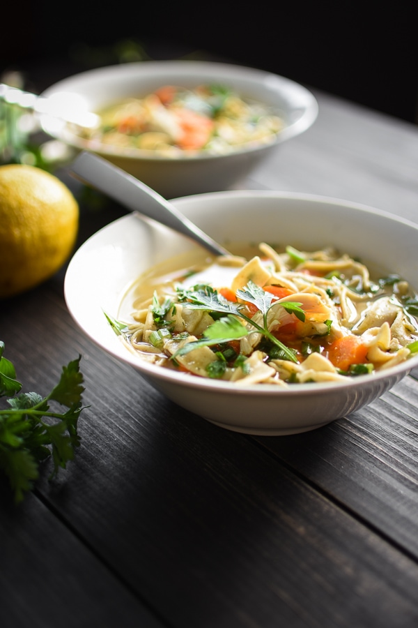 The addition of lemon and green onions brightens up my 21 Day Fix Instant Pot Lemon Chicken Noodle Soup while the Instant Pot makes it SO quick, easy and healthy!