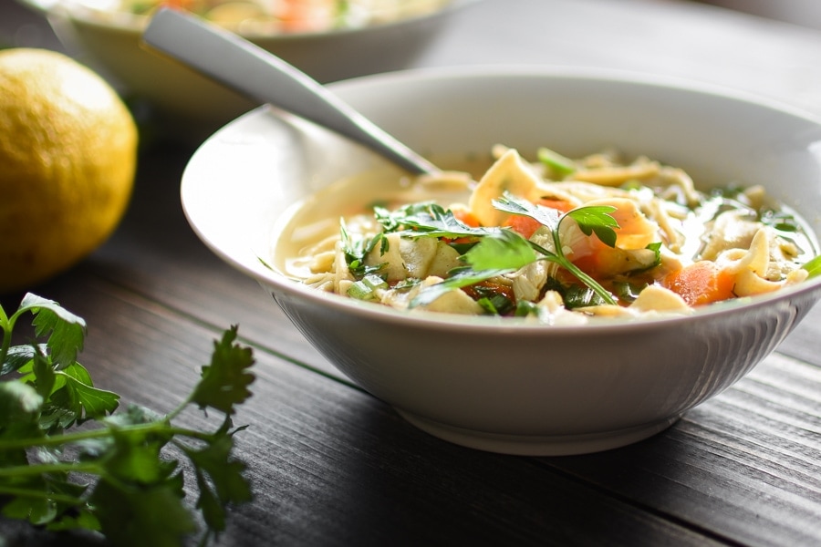 This healthy 21 Day Fix Instant Pot Lemon Chicken Noodle Soup is extra flav...