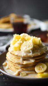 These easy whole wheat pancakes with Hawaiian coconut syrup make for a decadent yet healthy breakfast. They're the perfect treat for Mom this mother's day or a tasty breakfast for the whole family anytime! #breakfast #kidfriendly #mothersday #healthy #21dayfix #beachbody #weightloss #mealprep #brunch #recipe