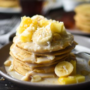 These easy whole wheat pancakes with Hawaiian coconut syrup make for a decadent yet healthy breakfast. They're the perfect treat for Mom this mother's day or a tasty breakfast for the whole family anytime! #breakfast #kidfriendly #mothersday #healthy #21dayfix #beachbody #weightloss #mealprep #brunch #recipe