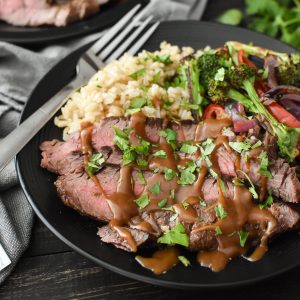 This easy flank steak sheet pan dinner cooks up quickly and is SO flavorful! A delicious healthy recipe that's perfect any night of the week! #portionfix #21dayfix #weightwatchers #healthy #healthydinner #quick #quickdinner #steak #thai #kidfriendly #glutenfree #dairyfree