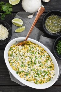 This Cheesy Salsa Verde Corn is a quick and easy side dish that's perfect for a potluck! Bonus: it only uses four ingredients and it's gluten-free! #21dayfix #healthy #cheese #weightwatchers #weightloss #mealprep #potluck #mexican #ultimateportionfix #portionfix #glutenfree #quick #sidedish #side #healthyside