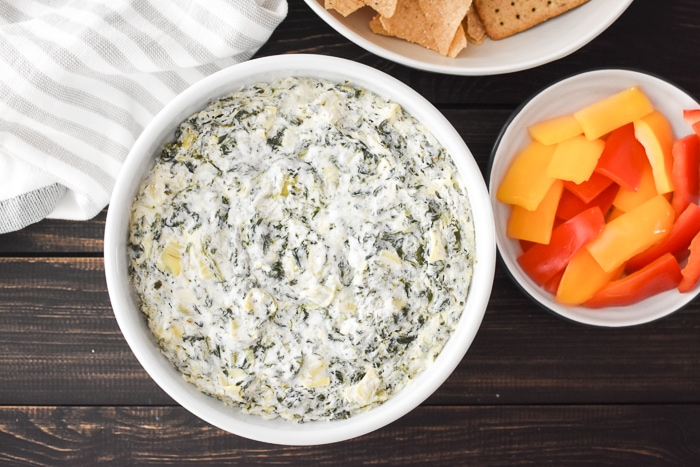 Quick Spinach and Artichoke Dip (made in Instant Pot or microwave) is the perfect last minute appetizer for any holiday or game day. Healthy, easy & delish! #21dayfix #weightwatchers #gameday #holiday #healthygameday #healthyholiday #snack #appetizer #healthysnack #healthyappetizer #mealprep #weightloss #kidfriendly #instantpot #microwave #party #partyfood #healthypartyfood #vegetarian #glutenfree