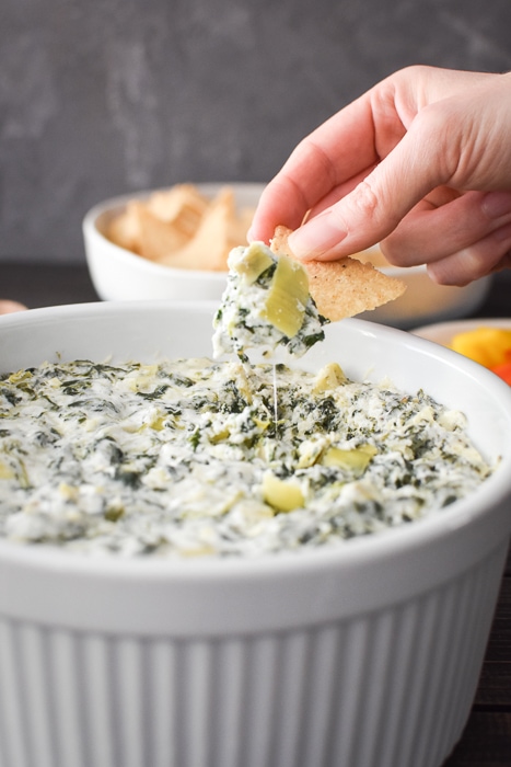 Quick Spinach and Artichoke Dip (made in Instant Pot or microwave) is the perfect last minute appetizer for any holiday or game day. Healthy, easy & delish! #21dayfix #weightwatchers #gameday #holiday #healthygameday #healthyholiday #snack #appetizer #healthysnack #healthyappetizer #mealprep #weightloss #kidfriendly #instantpot #microwave #party #partyfood #healthypartyfood
