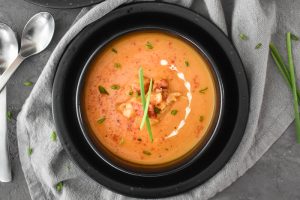 This Instant Pot Lobster Bisque is the perfect starter for Valentine's Day or date night. It's so easy, creamy, and rich! Dairy-free and gluten-free! #valentinesday #valentines #datenight #romance #glutenfree #dairyfree #lobster #healthy #21dayfix #weightwatchers #healthydinner #healthyvalentinesday #healthystarter #ultimateportionfix #portionfix #beachbody
