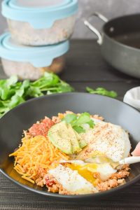 Eggs over fiesta rice in a bowl