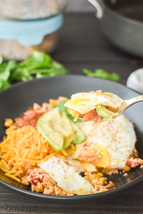 Eggs over fiesta rice in a bowl