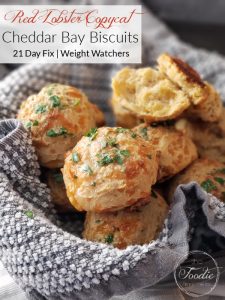 These Whole Wheat Cheddar Bay Biscuits are a healthier Red Lobster Copycat recipe and SO easy to make! Perfect for a date night in and 21 Day Fix and Weight Watchers friendly! #healthy #healthyside #redlobster #datenight #healthydatenight #21dayfix #weightwatchers #ww #weightloss #beachbody #wholegrains #valentinesday #mothersday #brunch #healthybrunch #kidfriendly
