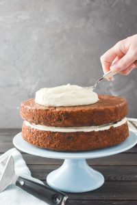 21 Day Fix carrot cake is tender, perfectly spiced with a delish, tangy frosting! Refined sugar-free, Weight Watchers and perfect for Easter! #21dayfix #upf #ultimateportionfix #weightwatchers #easter #healthyeaster #dessert #healthydessert #refinedsugarfree #goatcheese #holiday #healthyholiday #holidays #springrecipe #springrecipes