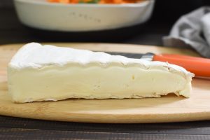 a wedge of brie cheese