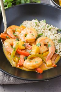 Thai Mango Curry with Shrimp in a bowl with rice