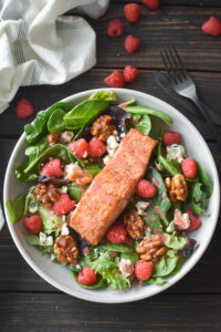a salmon salad with raspberry vinaigrette
